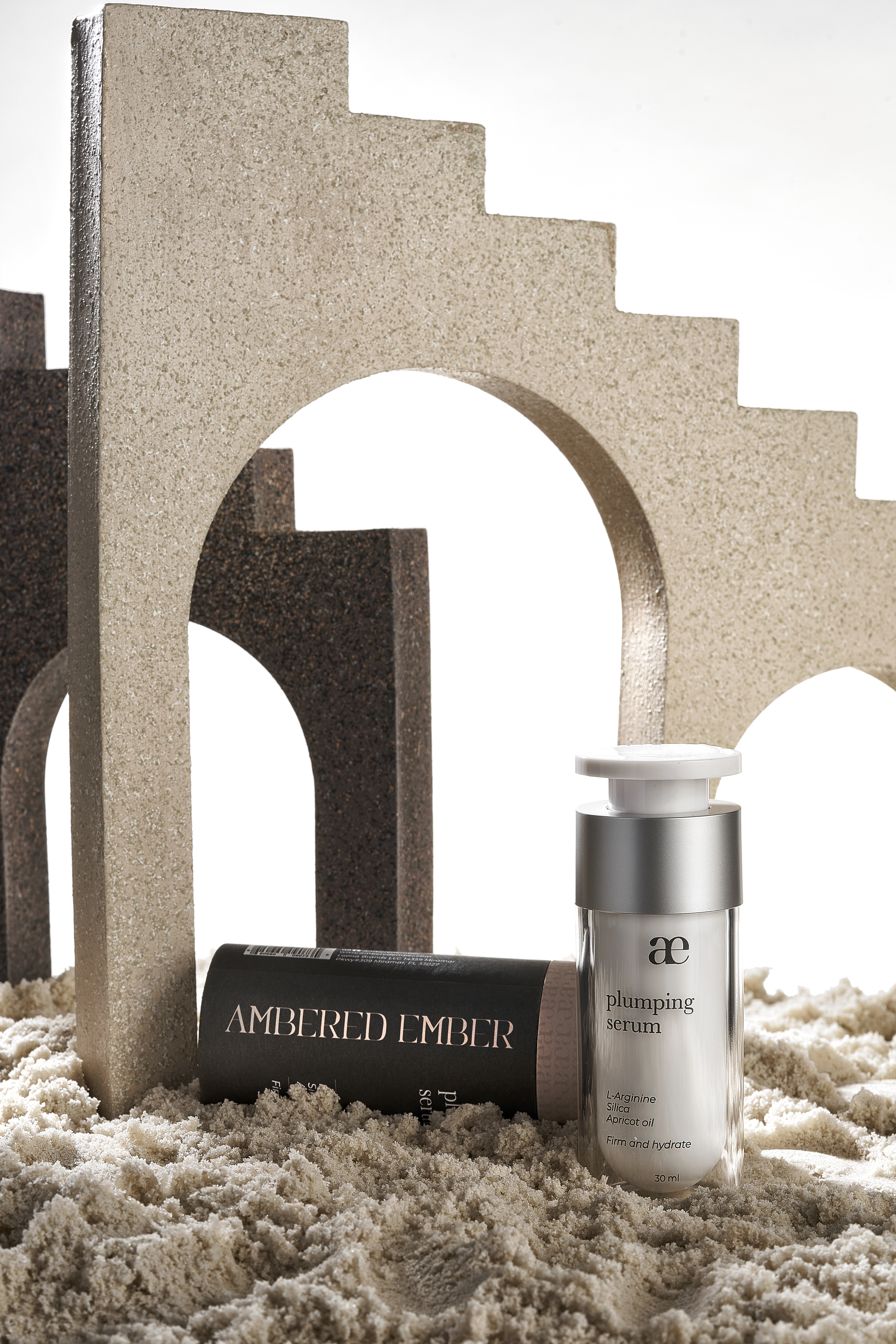 AE Plumping Serum in a warm amber setting